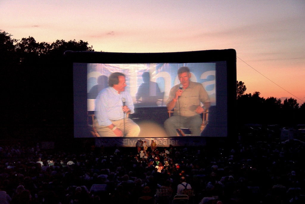 Jodi Maas, Director Michael Moore, Robert Deutsch (airscreen.us) in front of an AIRSCREEN classic 20m x 10m (66' x 33')